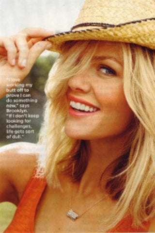 Ashley Hinshaw wearing Sterling Silver Chunky Wave Necklace as a bracelet on the  cover of Icon Magazine.