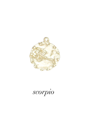 Buried Zodiac Treasure Coin on leather